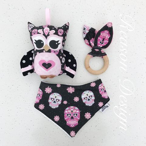 Pink and black sugar skull owl rattle, bib & teething ring set